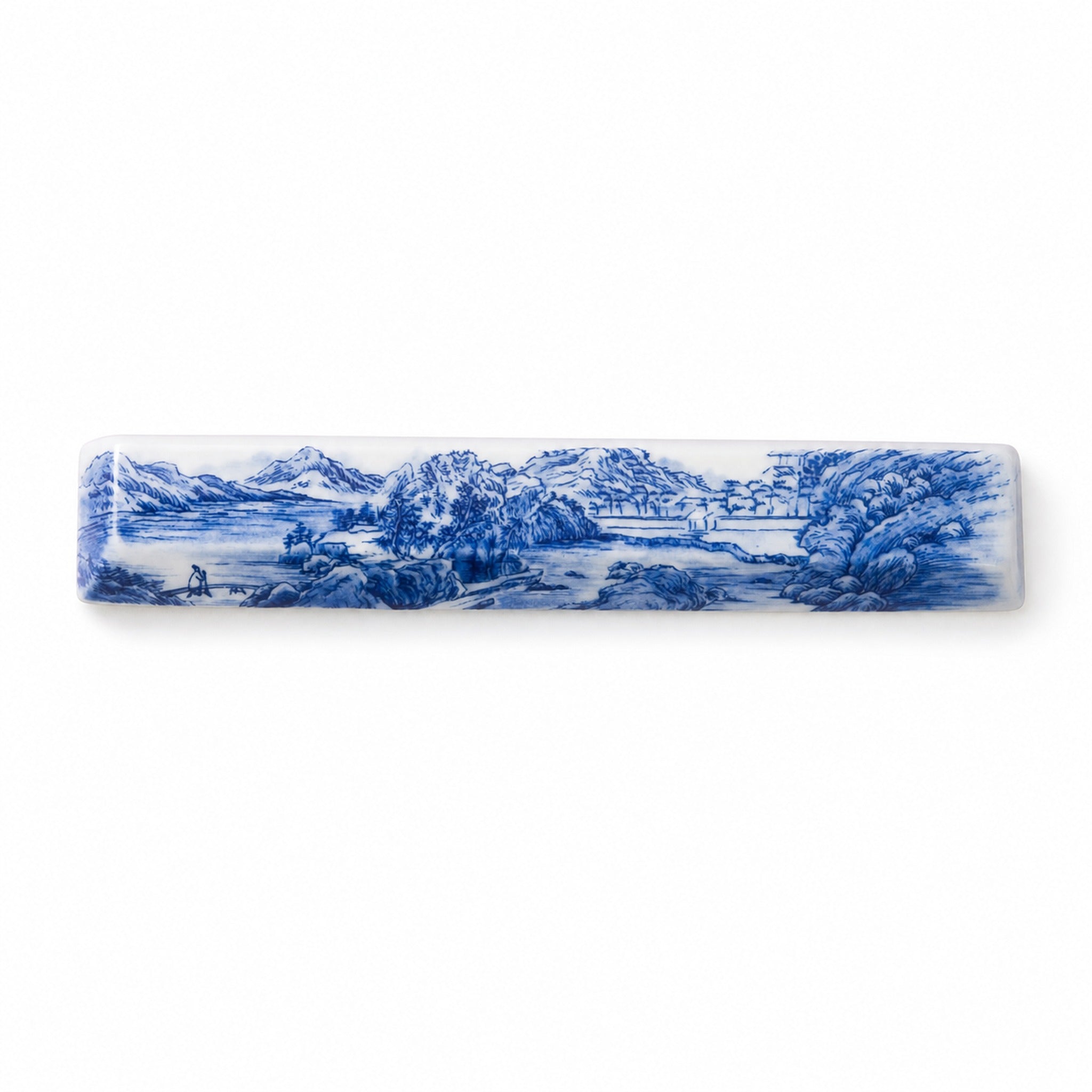 Blue mountain ceramic spacebar keycap on pure white background