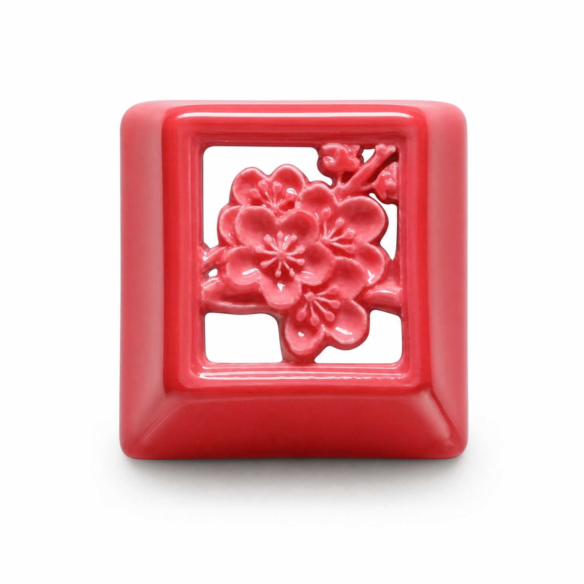 Vermilion blossom ceramic keycap on pure white background