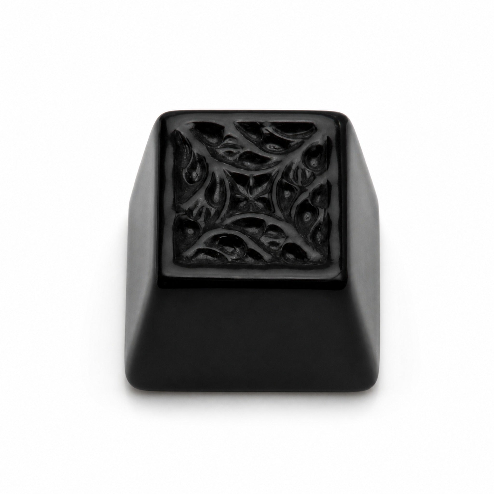 Ink relief black ceramic keycap on pure white background