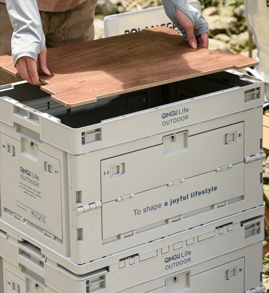 Removable wood top being lifted from the Setstead 65L Multifunction Storage Box