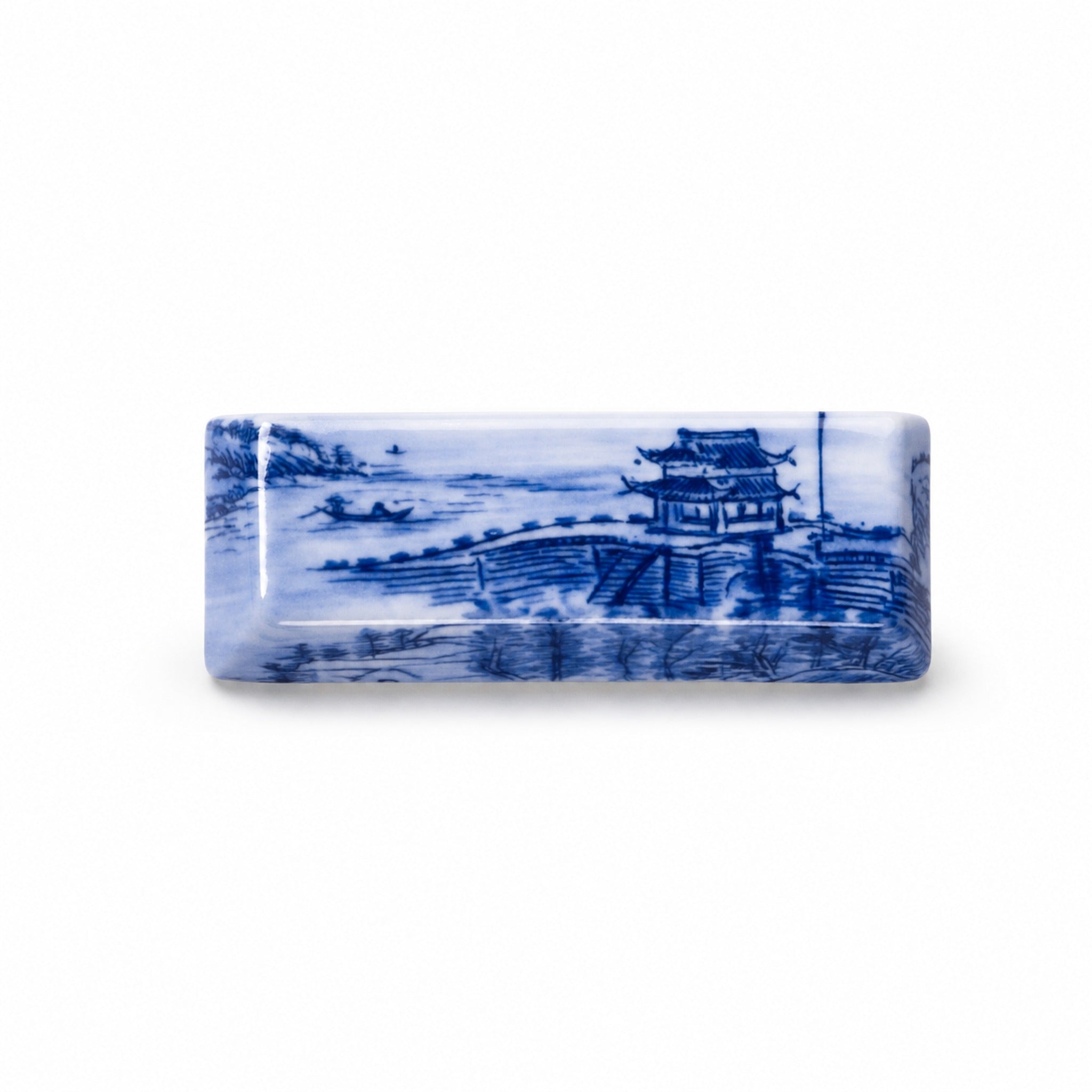 Blue pavilion ceramic keycap on pure white background